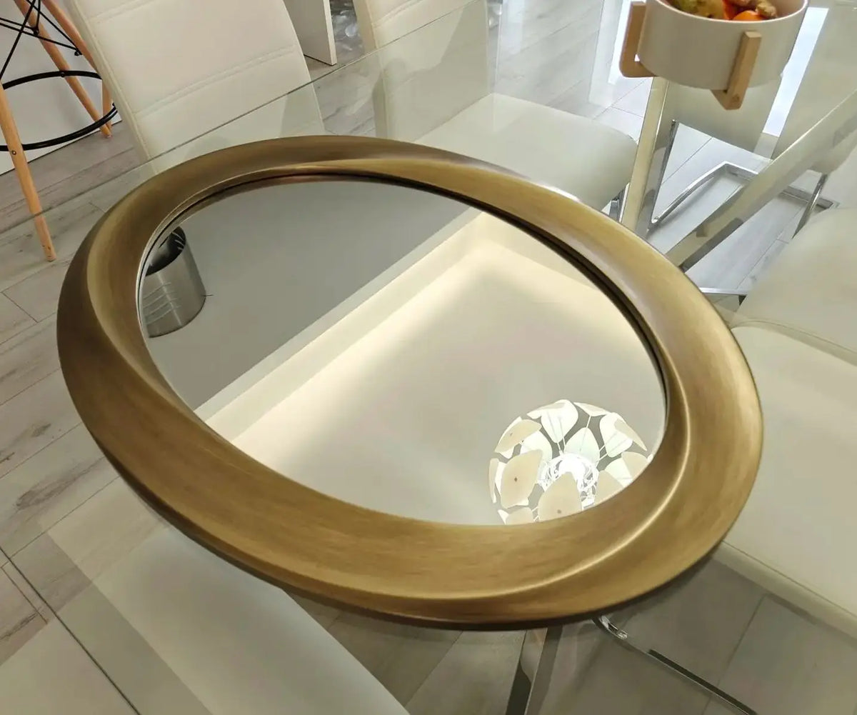 Oval Beveled Wall Mirror With Elegant Curved Frame