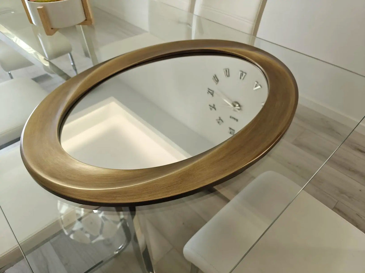 Oval Beveled Wall Mirror With Elegant Curved Frame